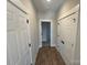 Bright hallway with hardwood floors and access to bedrooms at 5031 Mclaughlin Loop # 60, Waxhaw, NC 28173