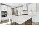 Modern kitchen with white cabinets and quartz countertops at 5031 Mclaughlin Loop # 60, Waxhaw, NC 28173