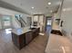 Modern kitchen with large island and stainless steel appliances at 5031 Mclaughlin Loop # 60, Waxhaw, NC 28173