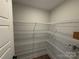 Walk-in pantry with wire shelving, providing ample storage space at 5031 Mclaughlin Loop # 60, Waxhaw, NC 28173