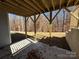 Covered patio with wooded views and access from the basement at 5031 Mclaughlin Loop # 60, Waxhaw, NC 28173