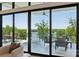 This is a large modern balcony overlooking the serene lake at 18304 Rosapenny Rd, Charlotte, NC 28278