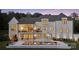 Spacious rear of home featuring an outdoor fireplace, balcony and sparkling pool at 18304 Rosapenny Rd, Charlotte, NC 28278