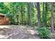 Wooded backyard with deck and playset at 508 Cobbs Glen Ct, Rock Hill, SC 29732