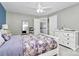 Bedroom with a purple floral comforter and white dresser at 508 Cobbs Glen Ct, Rock Hill, SC 29732