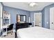 Bedroom with a white bed frame and a built-in desk at 508 Cobbs Glen Ct, Rock Hill, SC 29732