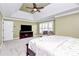 Main bedroom with carpeted floor, large bed, and a tv stand at 508 Cobbs Glen Ct, Rock Hill, SC 29732