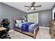 Bedroom with wood bed frame and a gaming chair at 508 Cobbs Glen Ct, Rock Hill, SC 29732