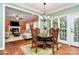 Kitchen views from adjacent dining area with hardwood floors and French doors at 508 Cobbs Glen Ct, Rock Hill, SC 29732