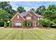 Brick two-story house with landscaping and a large yard at 508 Cobbs Glen Ct, Rock Hill, SC 29732