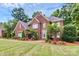 Two-story brick home with lush landscaping at 508 Cobbs Glen Ct, Rock Hill, SC 29732