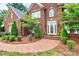 Brick front entrance with a curved walkway and landscaping at 508 Cobbs Glen Ct, Rock Hill, SC 29732