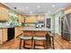 Bright kitchen features granite countertops, light wood cabinets, and a large island at 508 Cobbs Glen Ct, Rock Hill, SC 29732