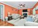 Bright living room with hardwood floors, fireplace, and large windows at 508 Cobbs Glen Ct, Rock Hill, SC 29732