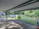 Spacious backyard with a pool, basketball hoop, green space and covered parking area at 3119 Hickory Hwy, Statesville, NC 28677