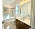 Well-lit bathroom with tile flooring, updated sink, shower and granite countertops at 859 Tamary Way # 34, Landis, NC 28088