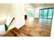 Bright living room with hardwood floors, large windows, and an open layout for versatile living at 859 Tamary Way # 34, Landis, NC 28088
