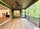 Charming screened porch offering wood floors, ceiling fan, and seamless access to the home's interior at 859 Tamary Way # 34, Landis, NC 28088