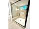 Beautiful walk-in shower with a glass door, bench, and tiled walls in a modern bathroom at 859 Tamary Way # 34, Landis, NC 28088