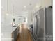 Modern kitchen with a large island and stainless steel appliances at 5860 Pittmon Ln, Kannapolis, NC 28081