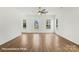 Bright, open-concept living room with hardwood floors and abundant natural light at 5860 Pittmon Ln, Kannapolis, NC 28081