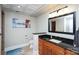 Bathroom featuring a vanity with dark granite countertops and patterned ceiling at 7582 Cottonwood Dr # 39, Denver, NC 28037