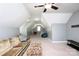 Spacious bonus room with plush carpet, dormer windows, and a comfortable seating area for relaxation and entertainment at 7582 Cottonwood Dr # 39, Denver, NC 28037