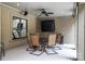 Outdoor patio featuring a ceiling fan, a wall-mounted speaker, and an outdoor dining set at 7582 Cottonwood Dr # 39, Denver, NC 28037