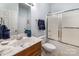 Cozy bathroom featuring a single sink vanity with a marble countertop and a shower-tub combination at 2518 Wellesbourne Ln, Sherrills Ford, NC 28673
