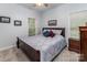 Comfortable bedroom with a window and dresser provides a cozy and relaxing atmosphere at 2518 Wellesbourne Ln, Sherrills Ford, NC 28673