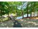 Pathway leads to a private dock overlooking the lake with boat slips at 2518 Wellesbourne Ln, Sherrills Ford, NC 28673