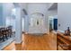 Bright foyer with hardwood floors and an arched entryway, open to dining area at 2518 Wellesbourne Ln, Sherrills Ford, NC 28673