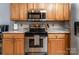 Well-equipped kitchen featuring stainless steel appliances and ample cabinet space at 2518 Wellesbourne Ln, Sherrills Ford, NC 28673