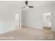 Bedroom with neutral carpet, a ceiling fan and an ensuite bathroom at 5830 Pittmon Ln, Kannapolis, NC 28081