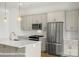 Beautiful kitchen with stainless appliances, stylish lighting, and a functional design at 5830 Pittmon Ln, Kannapolis, NC 28081