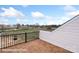 Relax on the rooftop deck with a view of the neighborhood and wood-look tile at 5830 Pittmon Ln, Kannapolis, NC 28081