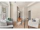 Serene home office with French doors, neutral tones, and modern desk, promoting a productive workspace at 2504 Stoneview Ct, Denver, NC 28037