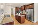 Well-equipped kitchen featuring stainless steel appliances, a central island and granite countertops at 2504 Stoneview Ct, Denver, NC 28037