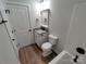 Bathroom with tub and shower combo, granite countertop, and modern fixtures at 9609 Stokes Ferry Rd, Gold Hill, NC 28071