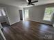 Bright bedroom featuring modern floors, neutral paint, and abundant natural light at 9609 Stokes Ferry Rd, Gold Hill, NC 28071