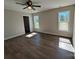 Bright bedroom featuring modern floors, neutral paint, and abundant natural light at 9609 Stokes Ferry Rd, Gold Hill, NC 28071