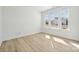 Bright bedroom featuring large windows and clean walls, perfect for relaxation and comfort at 121 Clawton Loop, Mooresville, NC 28115