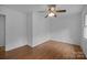 Bright bedroom with hardwood floors and ceiling fan at 3338 Passmore Rd, Rock Hill, SC 29730