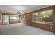 Bright sunroom with wood paneling and ample natural light at 3338 Passmore Rd, Rock Hill, SC 29730