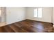 Bright bedroom with hardwood floors and ample closet space at 426 Saint Michaels Way, Fort Mill, SC 29708