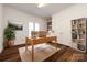 Home office featuring built-in shelving and hardwood floors at 426 Saint Michaels Way, Fort Mill, SC 29708