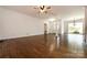 Open living area with hardwood floors, high ceilings and neutral colors at 426 Saint Michaels Way, Fort Mill, SC 29708