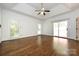 Main bedroom with hardwood floors, high ceilings and sliding doors to deck at 426 Saint Michaels Way, Fort Mill, SC 29708