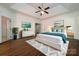 Spacious main bedroom with hardwood floors and access to the deck at 426 Saint Michaels Way, Fort Mill, SC 29708