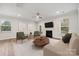 Living room with fireplace, comfortable seating, and large TV at 8336 Acadia Pkwy, Sherrills Ford, NC 28673
